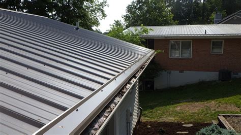 how to put gutter on a house metal roofing|gutters for metal roof overhang.